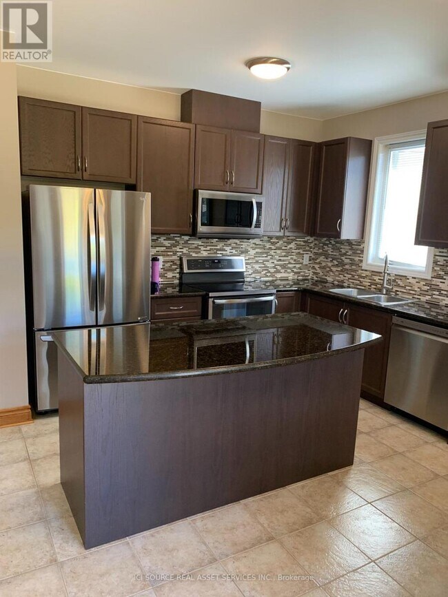 Photo du bâtiment - 12 Grand Poplar Ln
