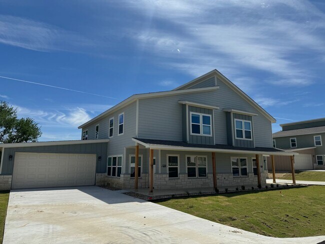 Building Photo - Beautiful modern Townhome in Peaster ISD NO Water Bill -  Fenced Yard - GATED: Spring Move in Spe...