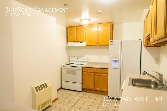 Building Photo - 302 N 16th Ave E