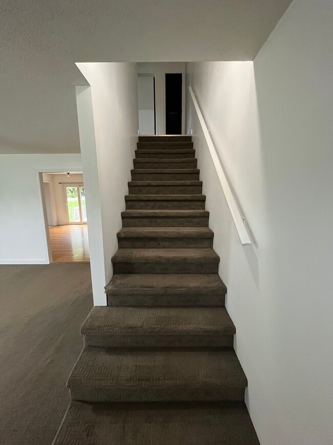 Living Room/Stairs - 701 Swadley Rd