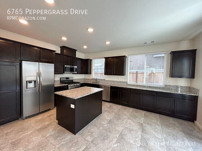 Foto del edificio - 6765 Peppergrass Drive