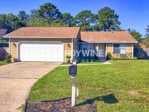 Building Photo - 8592 Bandera Cir W
