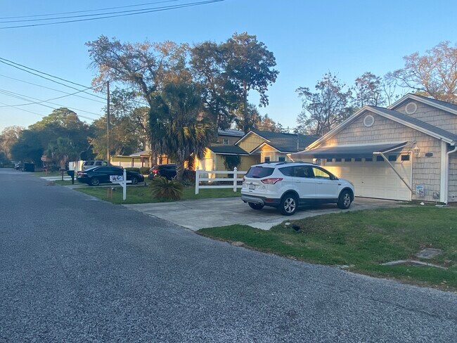 It's the only duplex on a dead-end street of well-kept single family homes - 1349 Camelia St