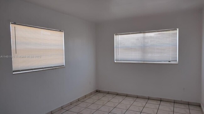 Building Photo - 7860 Harding Ave