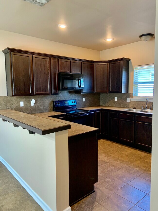 Lots of kitchen storage/refrigerator included - 42378 Cedarstone Ave