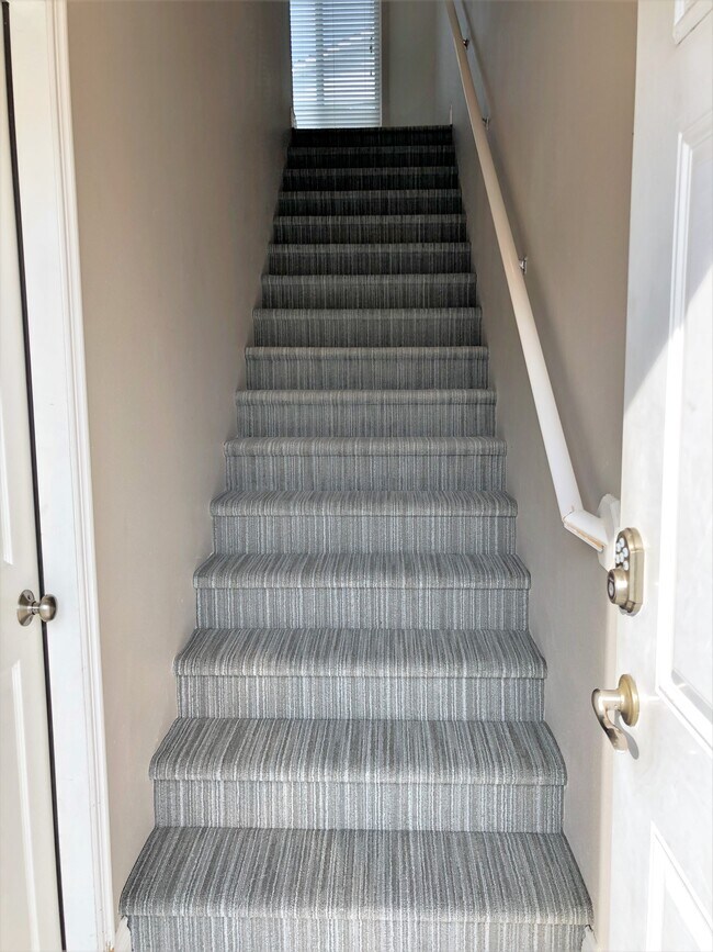 Stairs Up to Main Level - 256 E 56th Ave