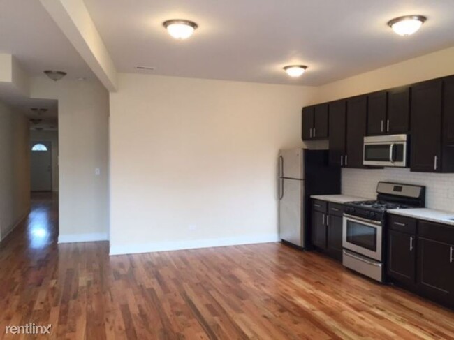 Foto del edificio - 1162-1168 E 54th Pl