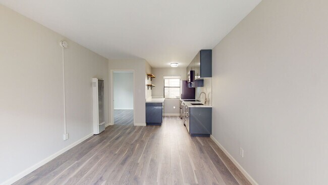 Foto del edificio - Remodeled modern 1 bedroom end unit, close...