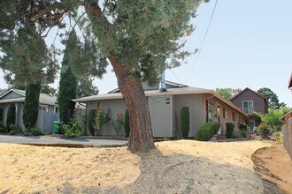 Building Photo - 7615-7615 N Curtis Ave Building Photo - 7615-7615 N Curtis Ave