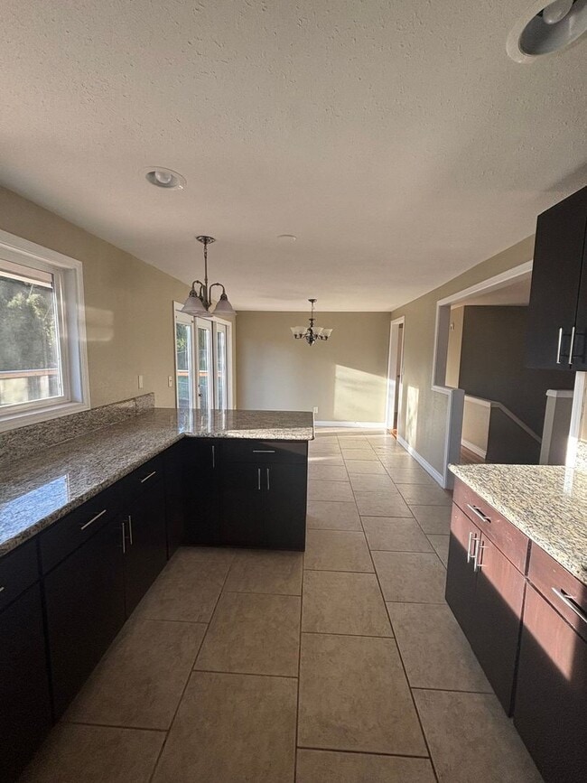 Building Photo - Stunning 4BR Family Home with Brand New Deck