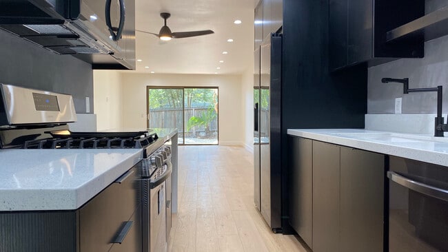 Kitchen facing Living room and outdoor patio - 6474 Cavalleri Rd