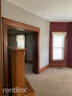 Building Photo - 5 br, 2 bath House - 205 E 5th St 1 Unit 1