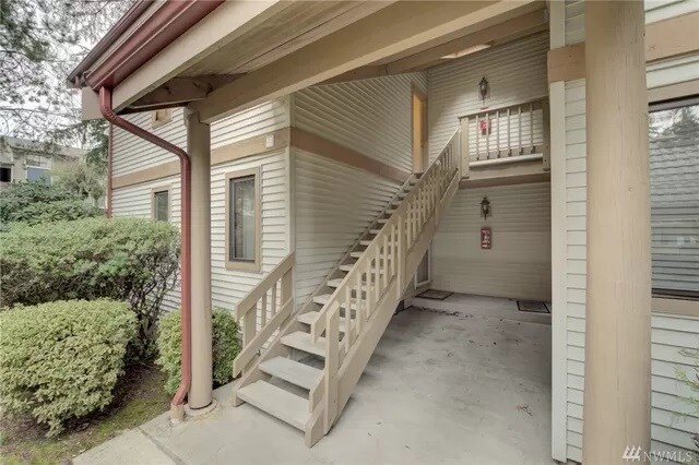A solid, supportive staircase access. - 17306 119th Ln SE