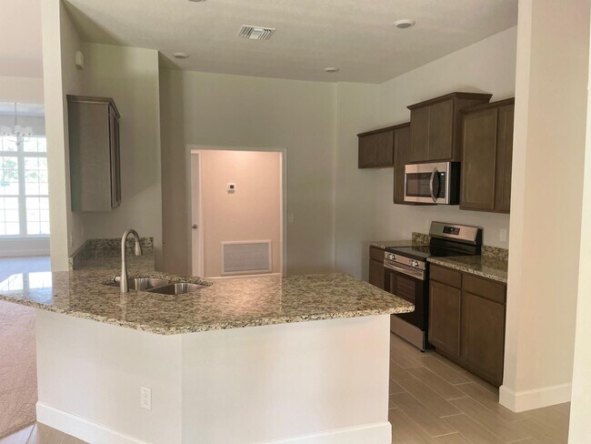 Foto del edificio - 5992 N Mahogany Ter