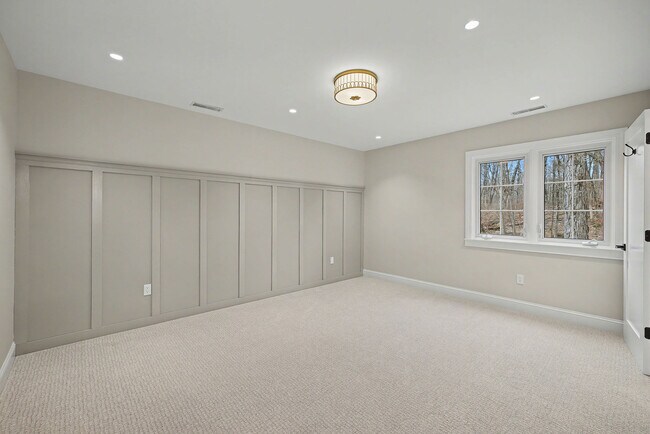Primary bedroom w accent wall - 156 Heatherwood Dr
