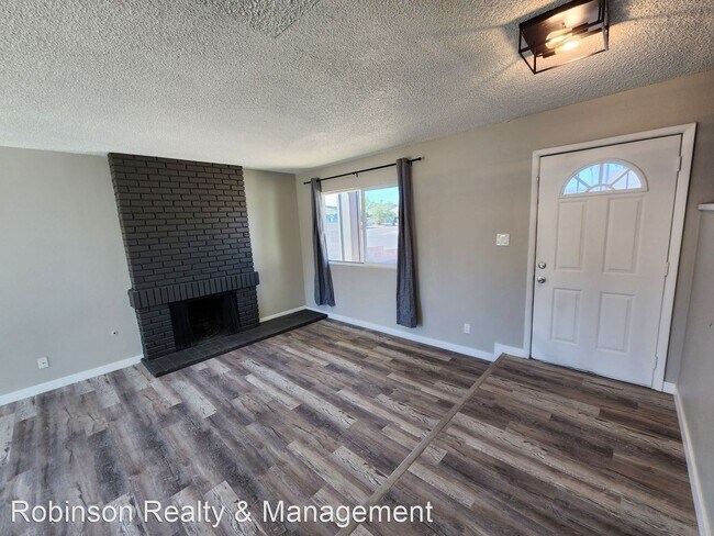 Building Photo - 4 br, 2.5 bath House - 3060 McLeod Dr