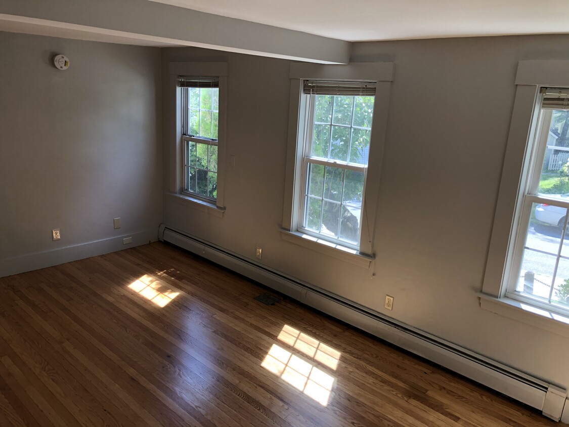 Living room. Lots of natural light. - 33 Pleasant St