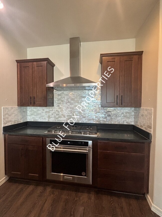 Building Photo - 8454 N Lone Ranger Rd