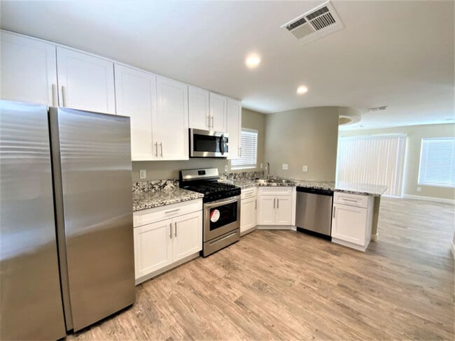 Building Photo - 864 Blue Rosalie Pl