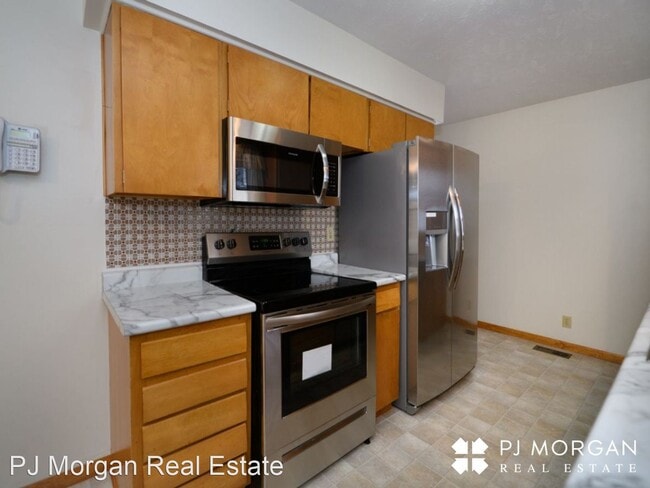 Building Photo - 3 br, 1.5 bath House - 4924 N 95th Circle