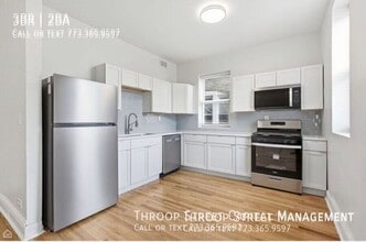 Building Photo - 6132 S Vernon Ave