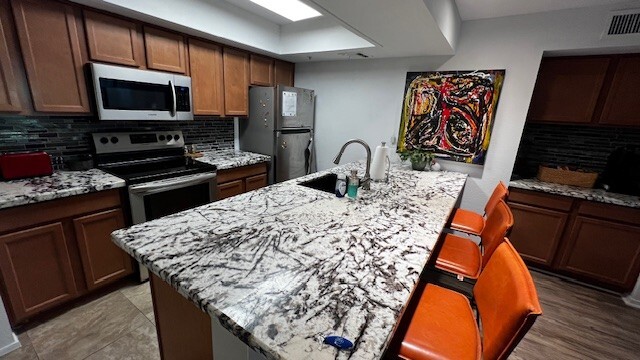 Kitchen has all new marble, appliances, sinks and glass backsplashes. - 7777 E Main St