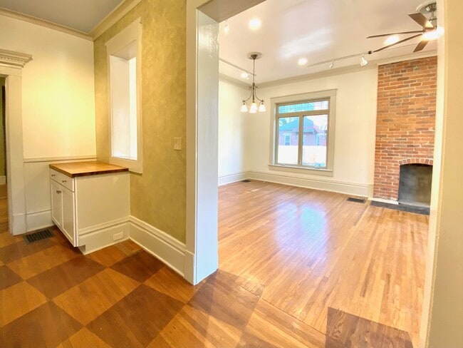 View from entryway into large sun room. - 1321 Highland St