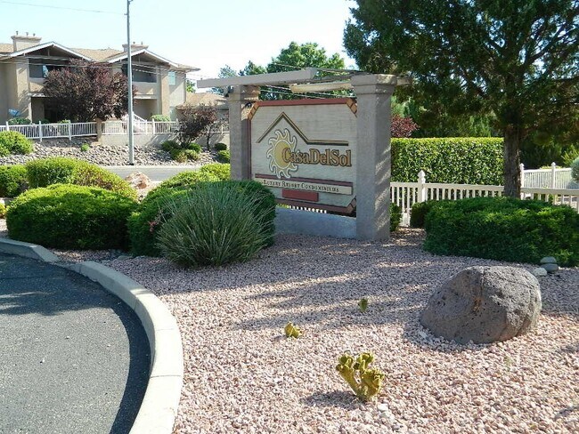 Building Photo - Charming, furnished, ground floor Condo with attached garage, pool and amenities