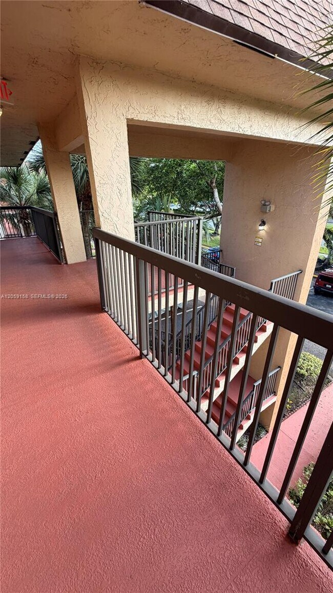 Building Photo - 6090 N Sabal Palm Blvd
