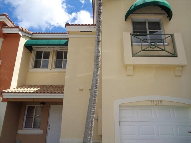Photo - 11379 NW 34th Place Unit Townhome
