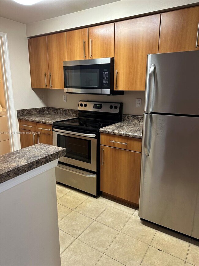 Foto del edificio - 5840 W Sample Rd
