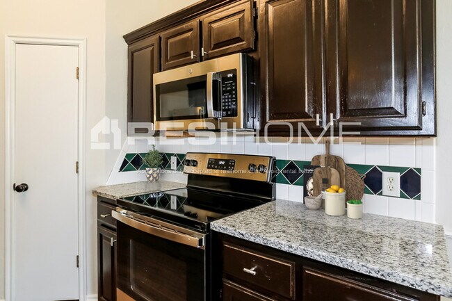 Building Photo - 3313 Coxwald Pl