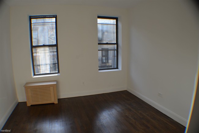 Building Photo - 214 E 89th St