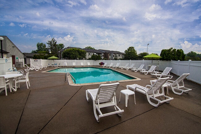 Heated Pool and Sundeck at Three Oaks - Three Oaks Apartments
