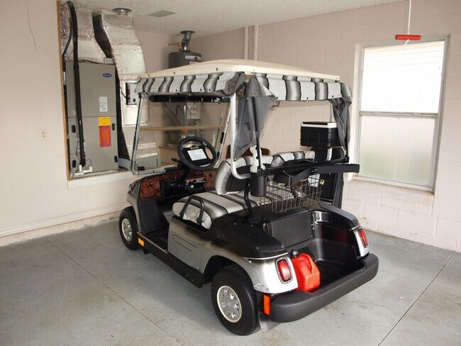 Building Photo - 3/2 Designer home with a Golf Cart