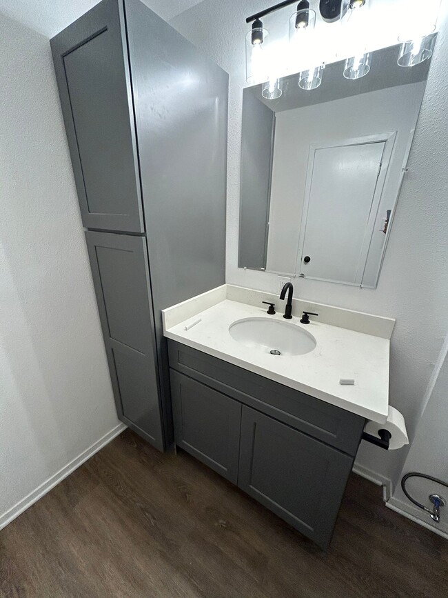 Primary Bedroom Vanity & Linen Cabinet - 5110 Dumore Dr