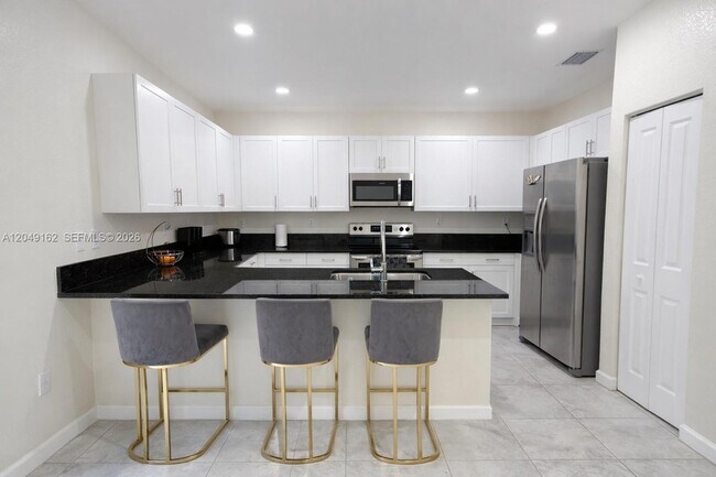 Photo - 323 NE 208th Terrace Townhome