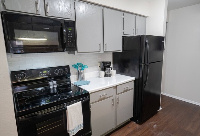 Upgraded Kitchen - The Brazos Apartments