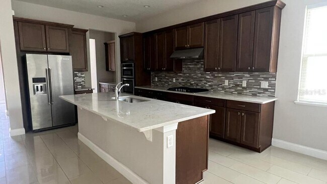 Building Photo - 10349 Royal Cypress Way