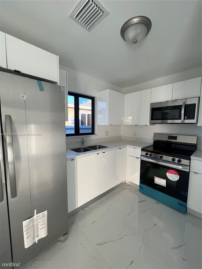 Foto del edificio - 3 br, 2 bath House - 7501 NW 16th Ave