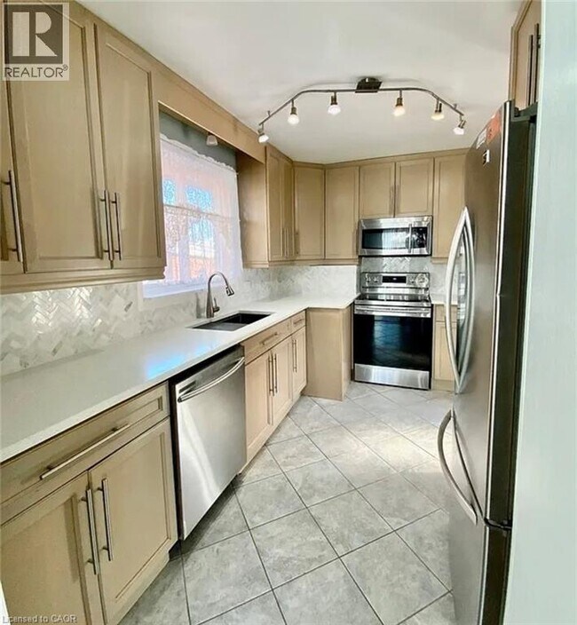 Photo du bâtiment - 7016 Hagar Ave