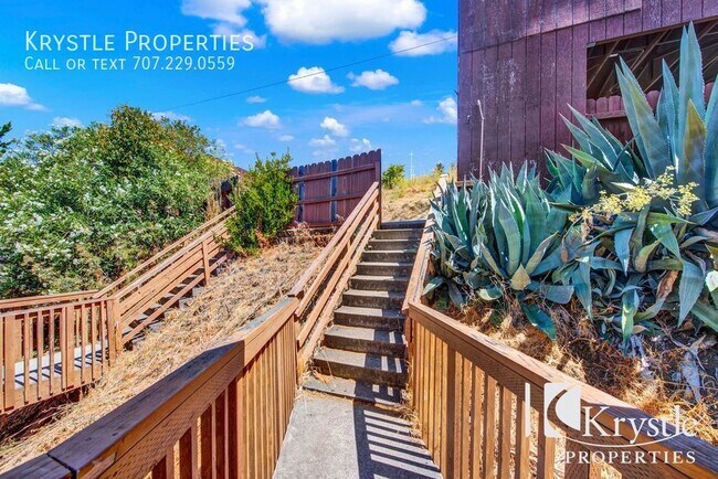Building Photo - Two story apartment with yard