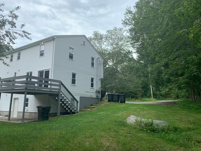 Back of the house showing private tenant deck - 41 Flagg Swamp Rd