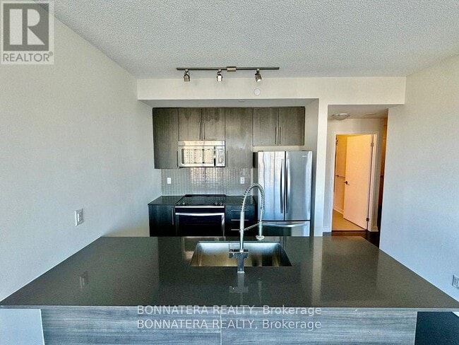 Building Photo - 326-4011-4011 Brickstone Mews