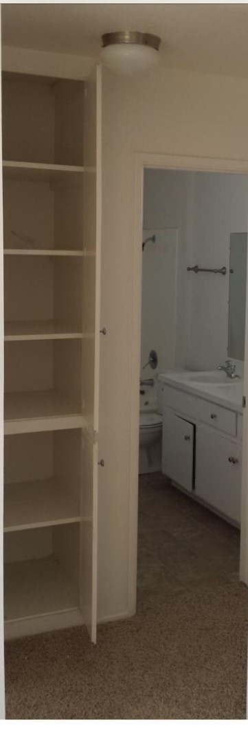 hallway cabinet/bath - Twin Oaks Apartments