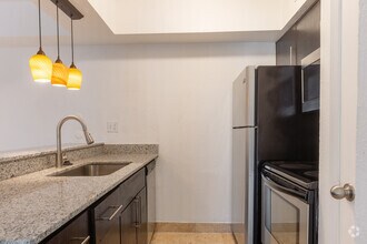 2BR,2BA-838SF-Kitchen - Cityscape Apartments