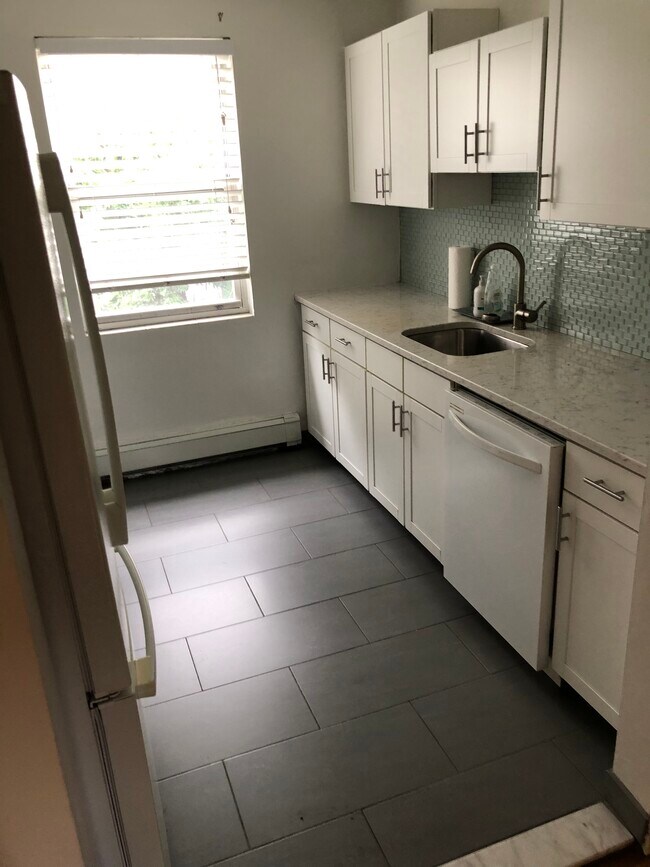 Newly renovated kitchen stainless appliances - 5925 Delafield Ave