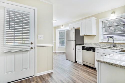 Building Photo - 6677 Songwood Dr