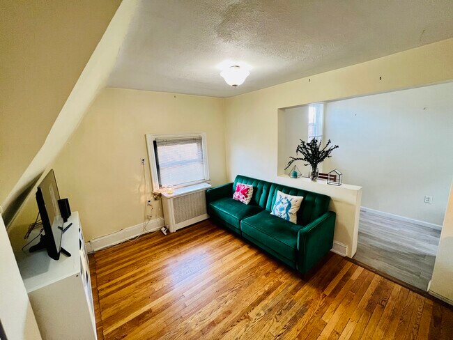 Sofa lays flat into a bed, great for guests - 3335 70th St