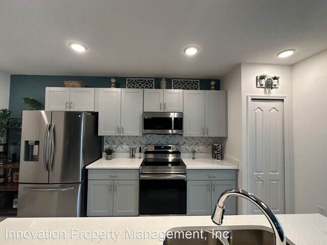 Building Photo - 4 br, 3 bath House - 1401 Orlando Ct